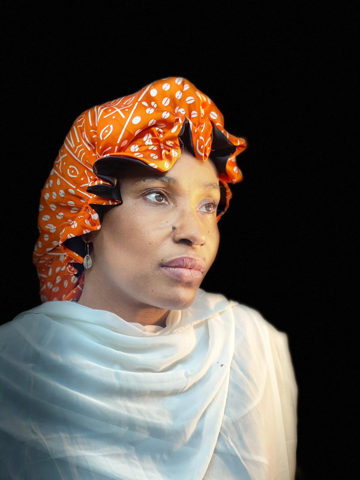 Mama Theresa´s Satin Schlafkappe für Afro-Locken - Orange Pattern- Bogolan Print