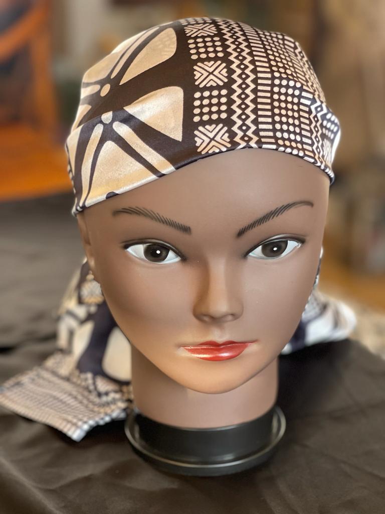 Mama Theresa´s Satin Schlafkappe Schwarz-Weiß Augen -Bogolan Print